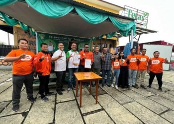 Dr Erikson Sianipar bersama PT POS memperingati Hari Tani Nasional di Tapanuli Utara.
