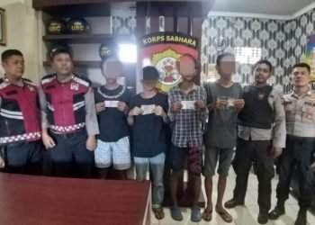 Polisi menangkap empat pelaku pungli di Belawan.