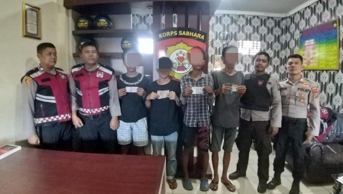 Polisi menangkap empat pelaku pungli di Belawan.
