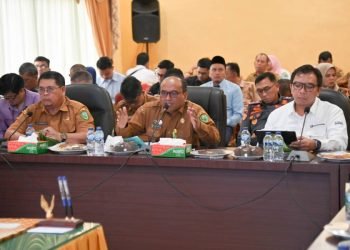 Pj Wali Kota Padangsidimpuan Dr. H. Letnan Dalimunthe saat memberikan sambutan pada rapat High Level Meeting (HLM) Tim Pengendali Inflasi Daerah (TPID) di aula Kantor Walikota Padangsidimpuan. (IST)