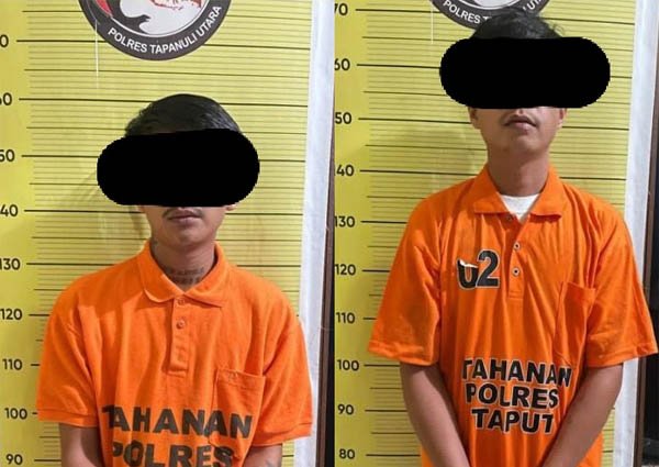 Kedua tersangka diamankan di Mapolres Taput. 