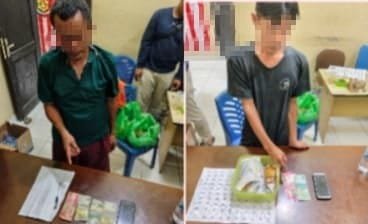 Dua pria lansia diduga penulis togel ditangkap Polres Toba.