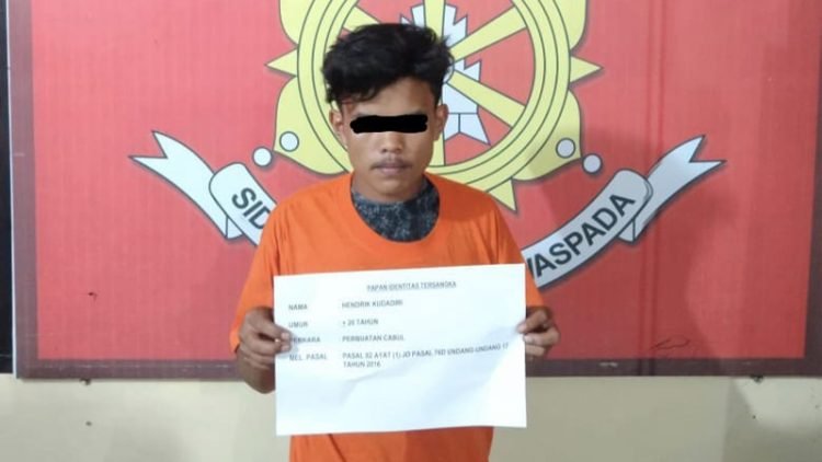 Tersangka HK diamankan di Polres Dairi. 