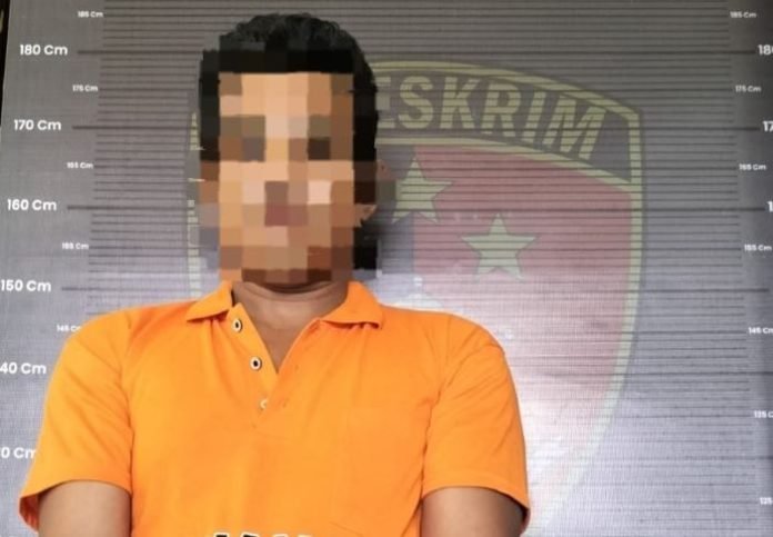 Tersangka di Polres Taput.