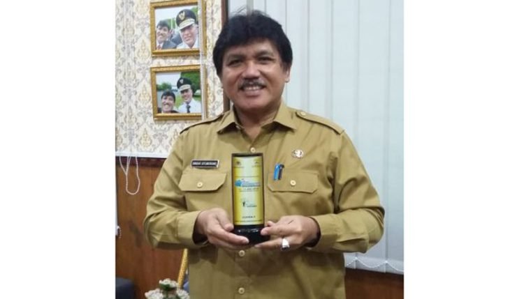 Mantan Kadis Lingkungan Hidup dan Kehutanan (LHK) Provinsi Sumut Binsar Situmorang.