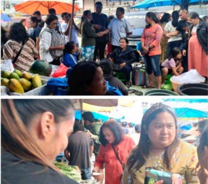 Paslon Effendi Napitupulu dan Audi Murphy Sitorus blusukan di Pasar Tradisional Porsea. (IST)