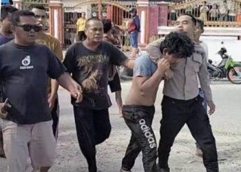 Pelaku pencabulan saat diamankan polisi. (IST)