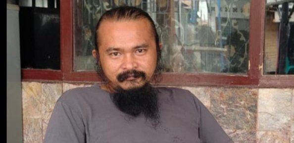 Adhikara Hutajulu saat menyampaikan laporan soal dugaan kasus korupsi pengadaan bibit jagung tahun 2021 kepada pihak Kejaksaan Negeri Toba Samosir.  (ist)