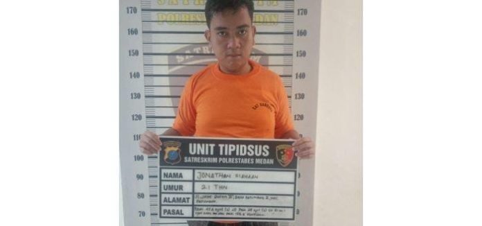 Jonatan Siahaan setelah ditetapkan tersangka. 