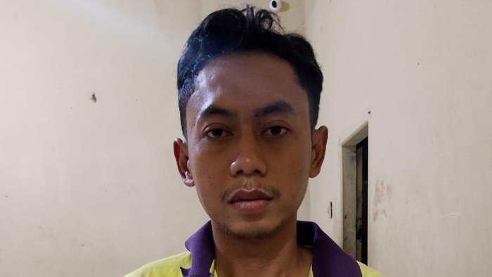 Tampang Agus Wandana yang tega membacok istrinya. 
