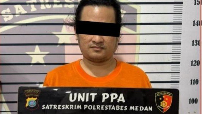 Pelaku BI usai diamankan petugas kepolisian.